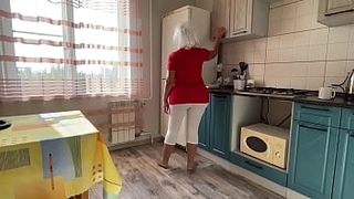 Stepmom with a big ass sucks dick and has anal sex with her son in the kitchen