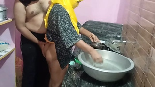 Stepsister has sex with stepbrother in the kitchen