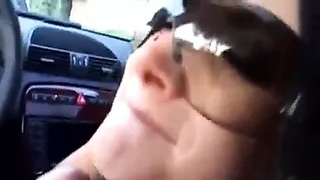 Slut giving a car blowjob with cum in mouth and swallow
