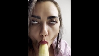 Deep blowjob to a banana, ending in her mouth...