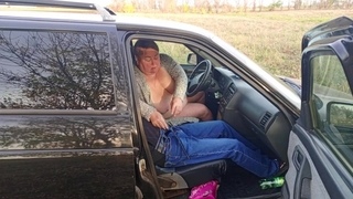 jerking off a dick in a car in nature