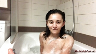 Solo pussy play with big natural toy in bath
